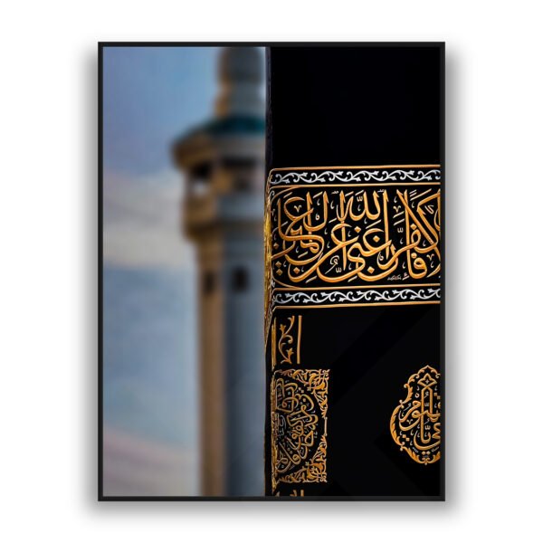 Close-up of the Kaaba’s black cloth with intricate golden Arabic calligraphy and decorative details.