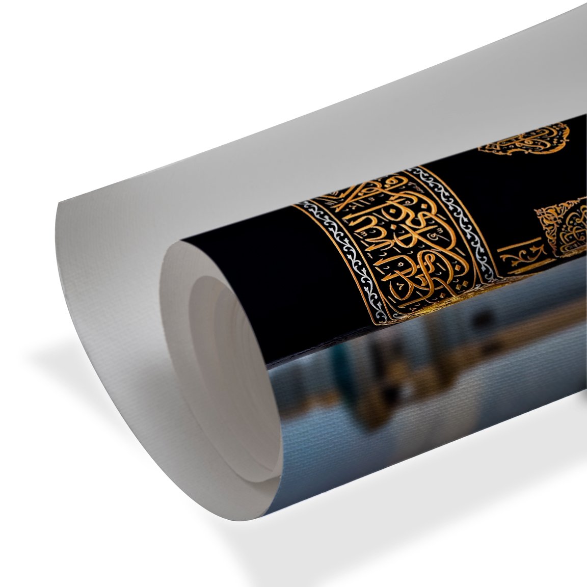 Close-up of the Kaaba’s black cloth with intricate golden Arabic calligraphy and decorative details.